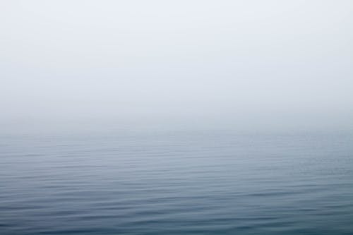 Free Body of Water Under Fog Stock Photo