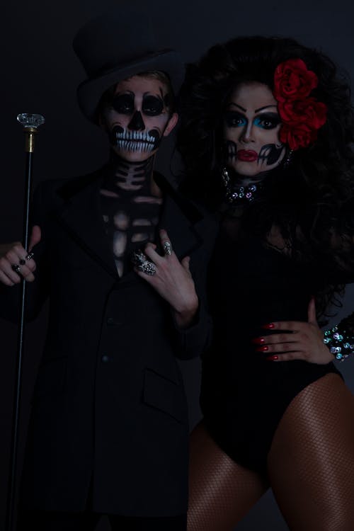 Couple with Eerie Makeup in Dark