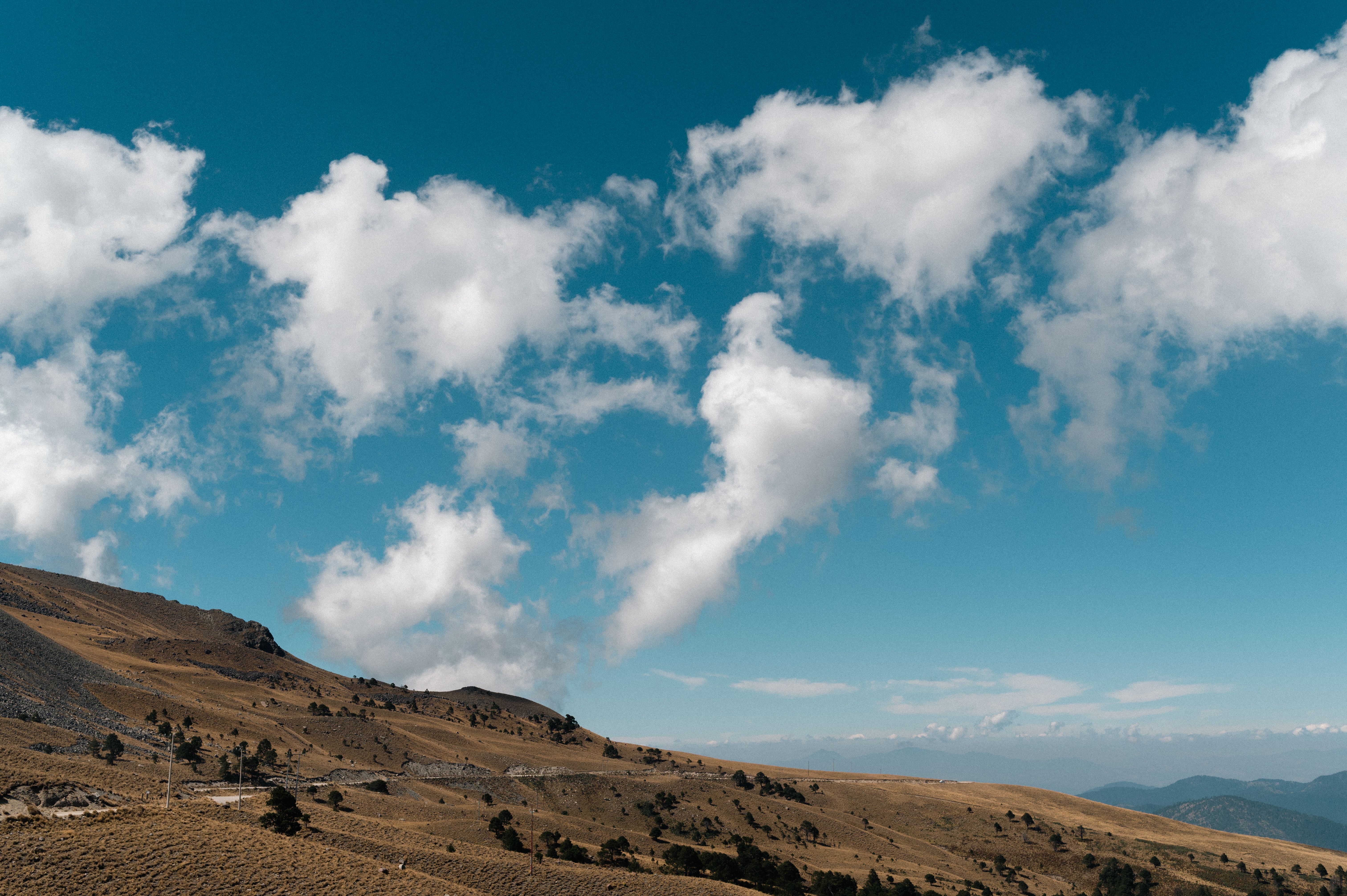 Mountain under Blue Sky and White Clouds · Free Stock Photo