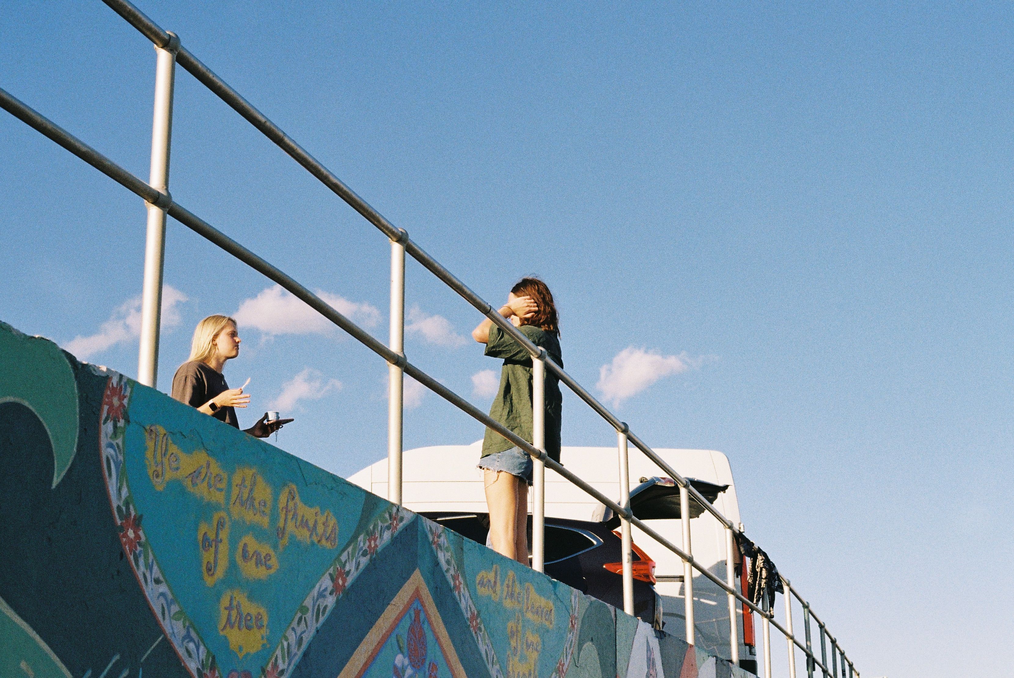 A diverse community gathering in a regional NSW town square reflecting the modern Australian landscape.