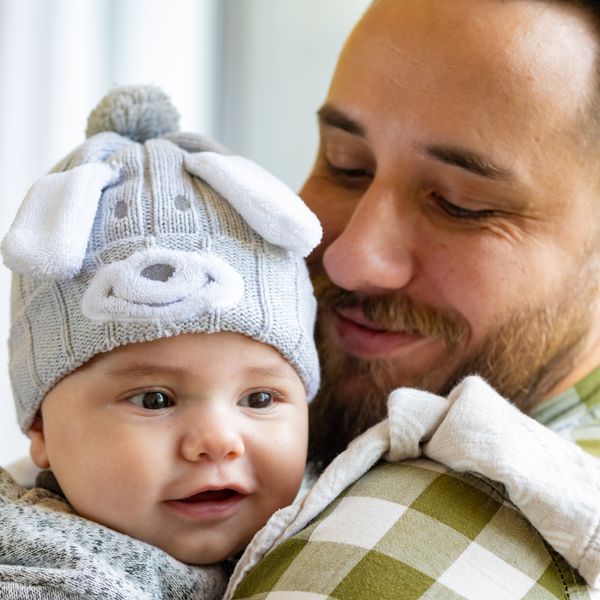 A father holding his baby — photo by Pavel Ariel Alexandrovsky on Pexels