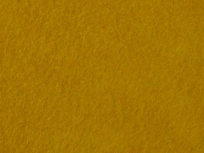 Warm ochre felt surface &mdash; photo by Engin Akyurt on Pexels