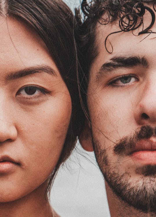 Half-Portraits of Asian Young Woman and Young Man by Each Other