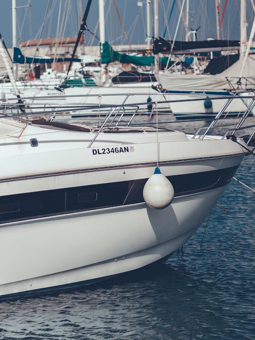 White Yacht Moored on Sea Shore