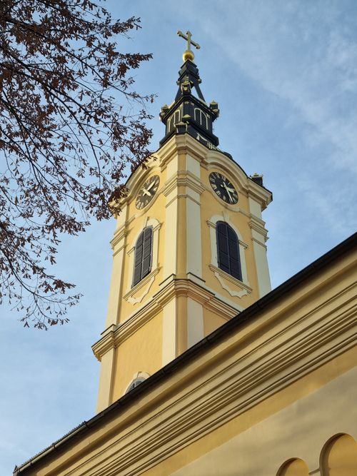 Free Low angle shot of St. Nicholas Church clock tower in Belgrade under a blue sky. Stock Photo