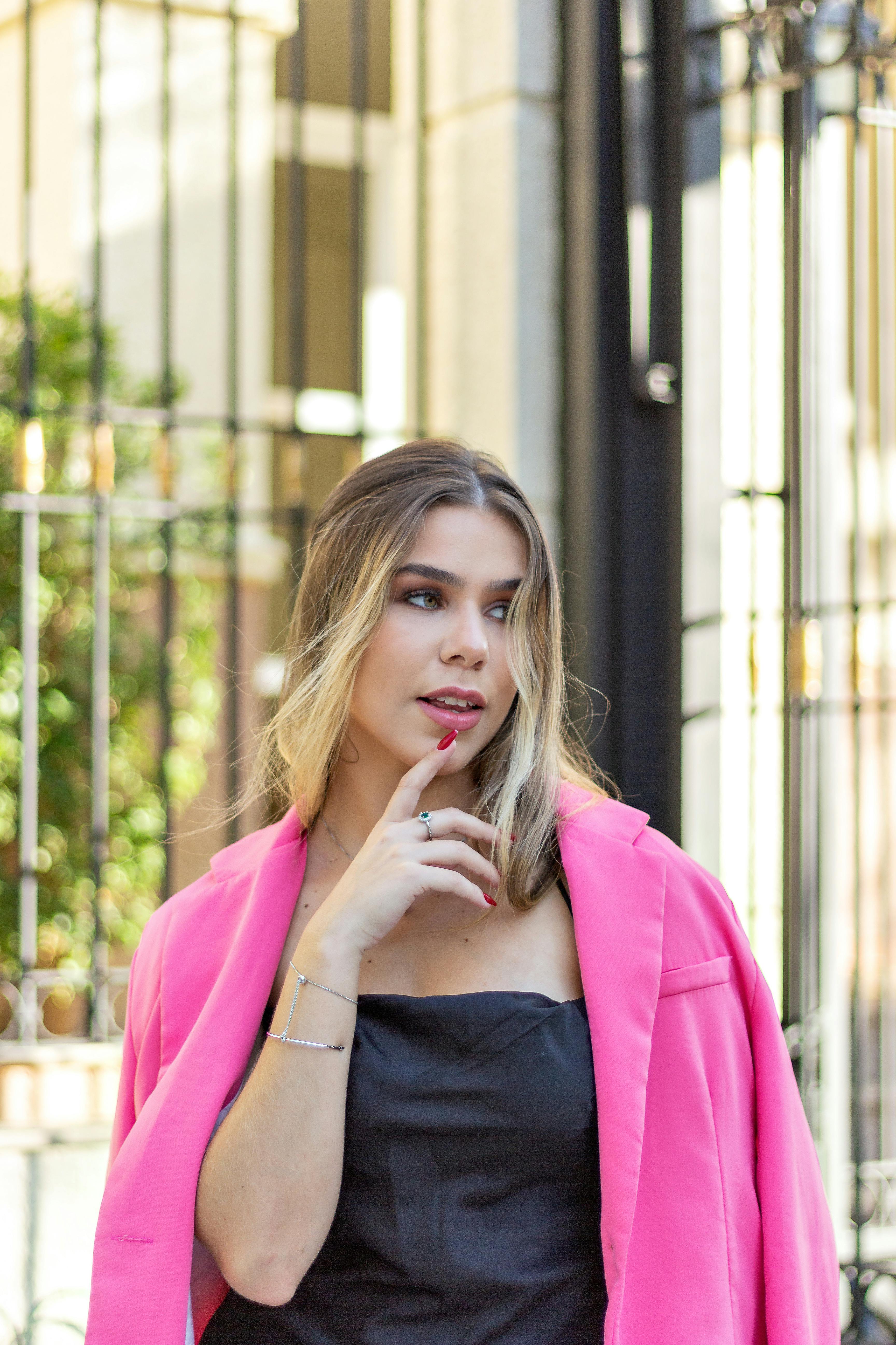 Blurred Woman in Pink Jacket · Free Stock Photo