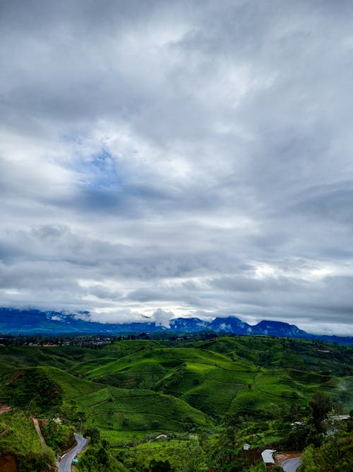 Clouds over Green Hills in Countryside