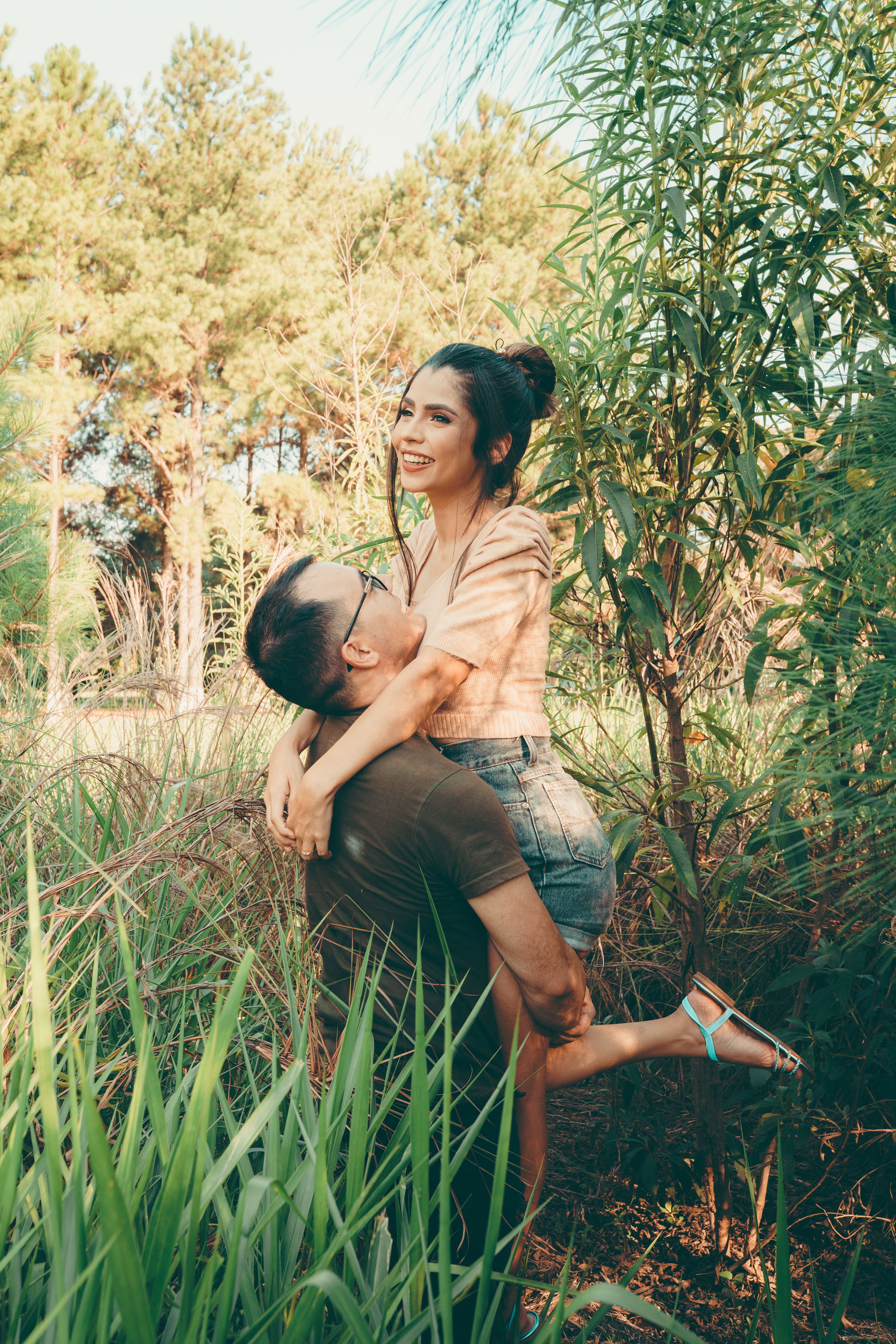 Man Holding a Woman in his Arms · Free Stock Photo