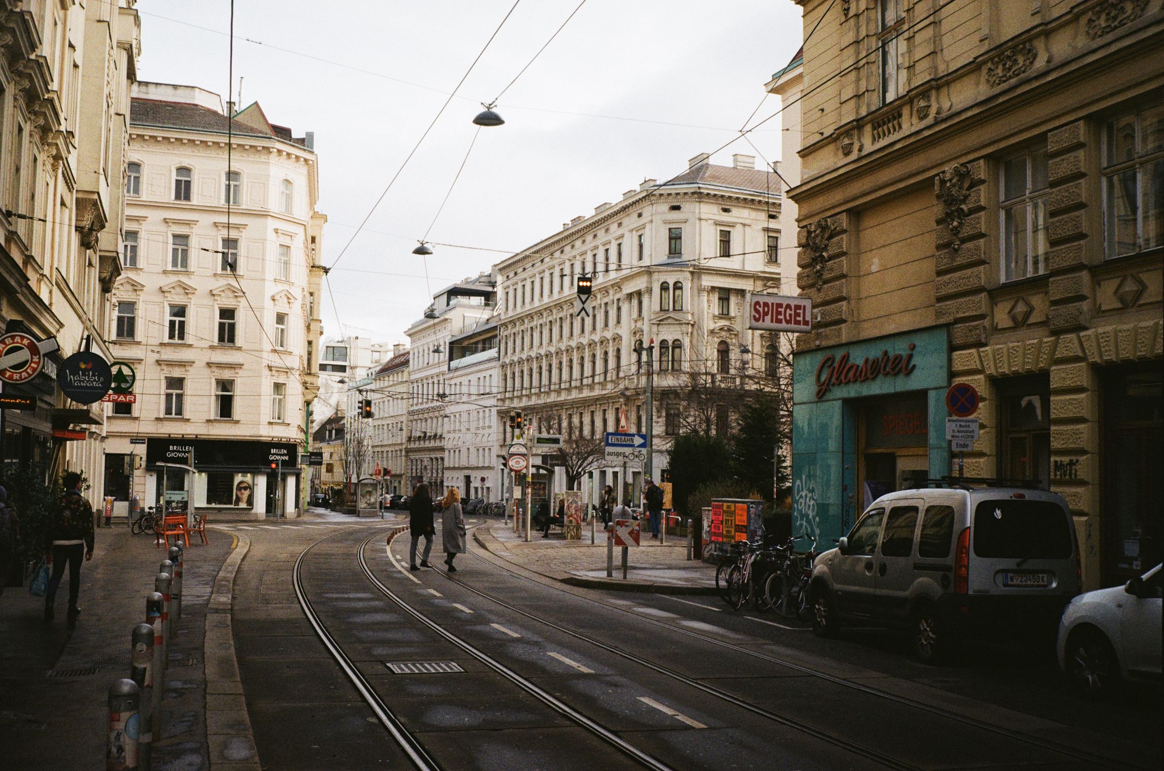 A picturesque street scene showcasing historic European architecture and a typical urban setting.