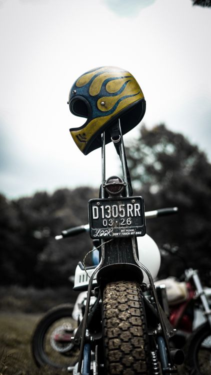 Photo of Motorcycle Helmets on a Motorbike Free Stock Photo Photo of Motorcycle Helmets on a Motorbike Free Stock Photo