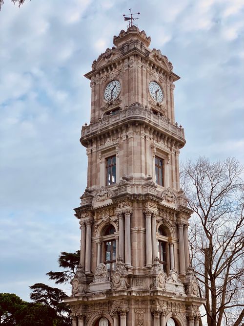 Free Discover the historical Dolmabahçe Clock Tower, a famous landmark in Istanbul, Turkey. Stock Photo