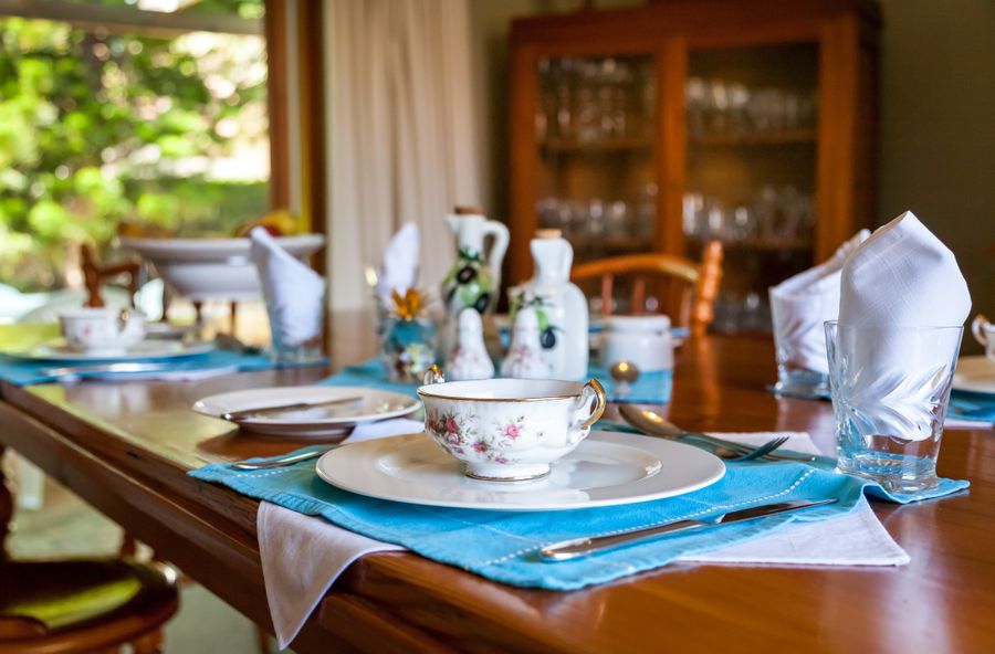 Elegant formal table setting with fine china and glassware