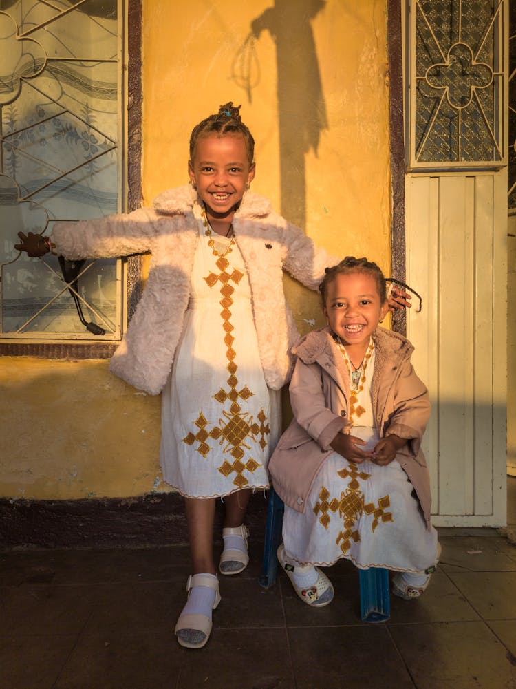 Smiling Girls In Dresses For Ceremony