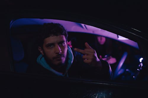 A Man Doing a Hand Signal