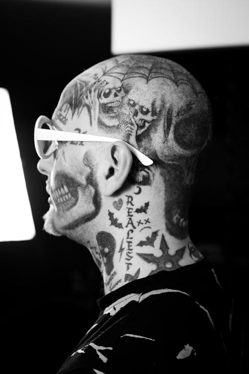 A Man with Face Tattoos · Free Stock Photo