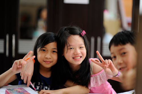 Two Girls Posing Together 