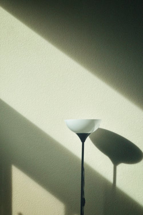 Lone Lamp, Shadow and Light on Wall