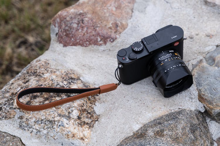 Top View Of A Leica Q2 Digital Camera On A Rock