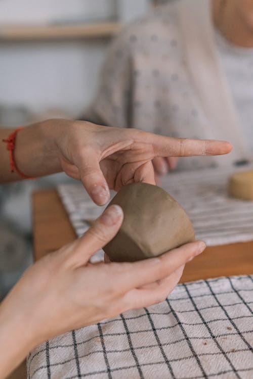 A Person Working with Clay