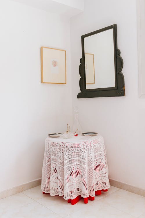 Table and a Mirror in a Domestic Room 