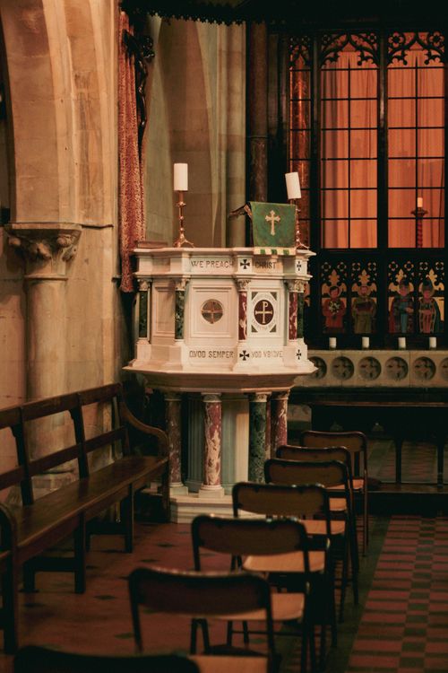 Elegant Church Interior with Ornate Pews · Free Stock Photo
