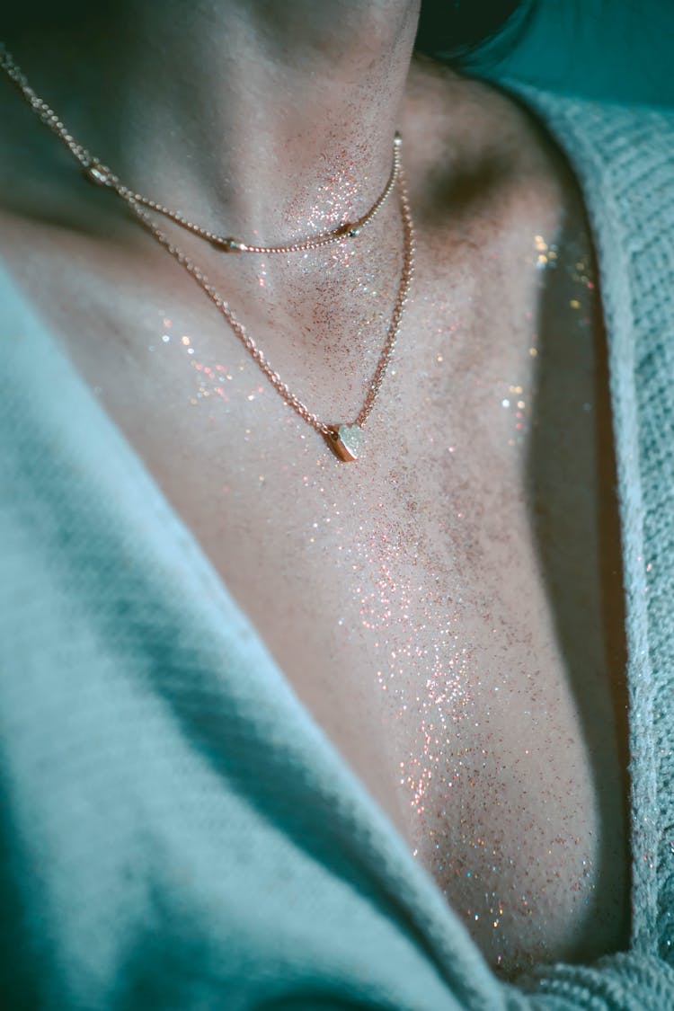 Photo Of Womans Chest Covered In Glitter