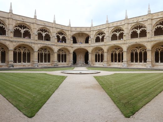 A view of the historic ornamental cloister of Jerónimos Monastery in Lisbon, Portugal.