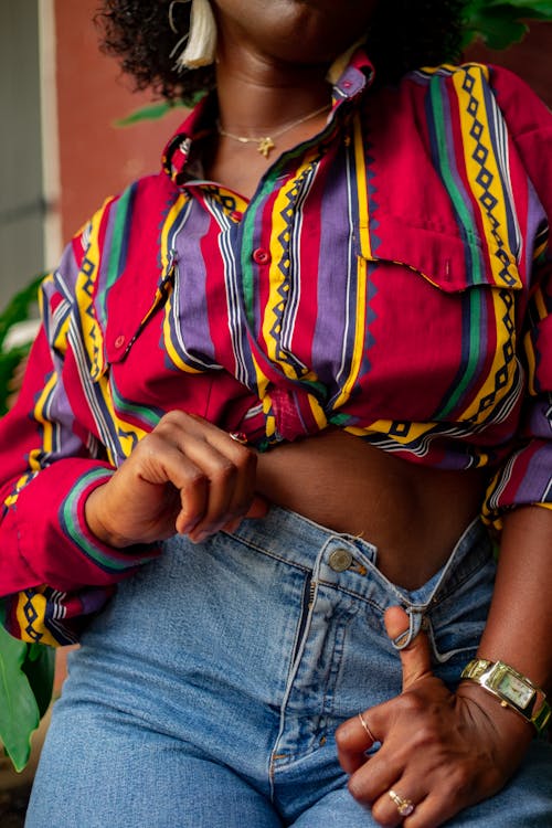 Woman Wearing Red and Multicolored Crop Top