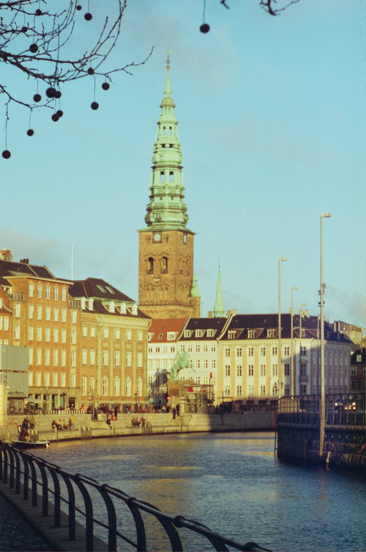 Church Tower Over Canal In Copenhagen