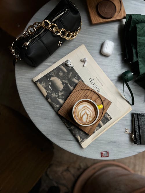 Free Coffee Cup on Newspaper Stock Photo