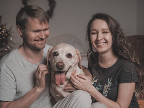 A Man and Woman with Dog 