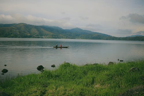 Безкоштовне стокове фото на тему «катання на човнах, люди, озеро» стокове фото