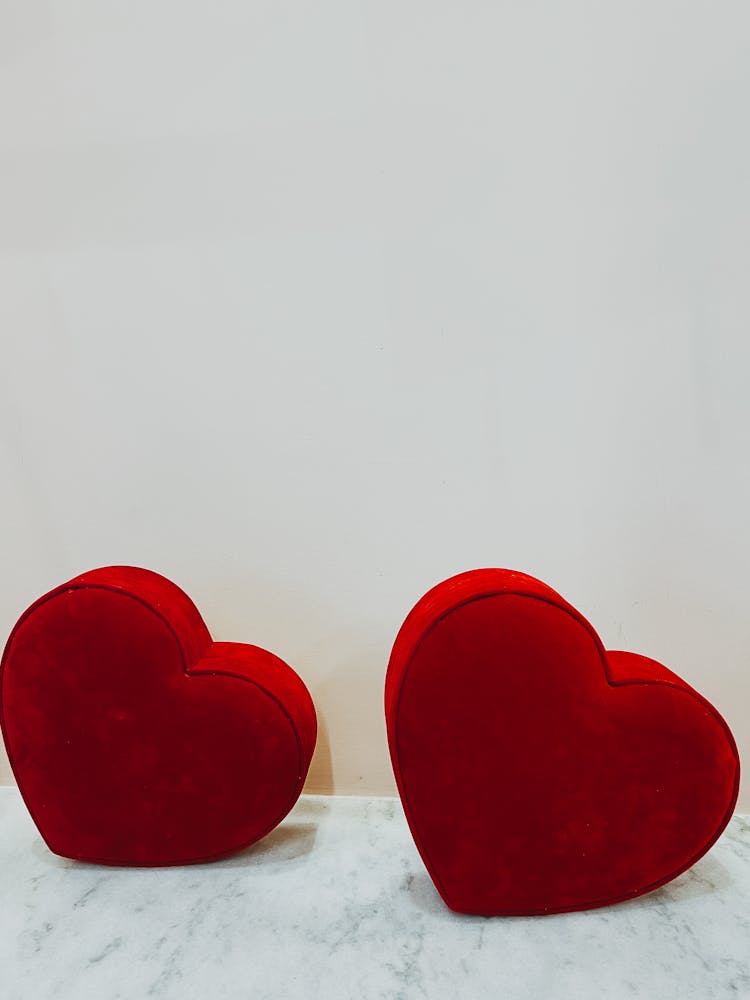 Two Red Hearts On A White Background