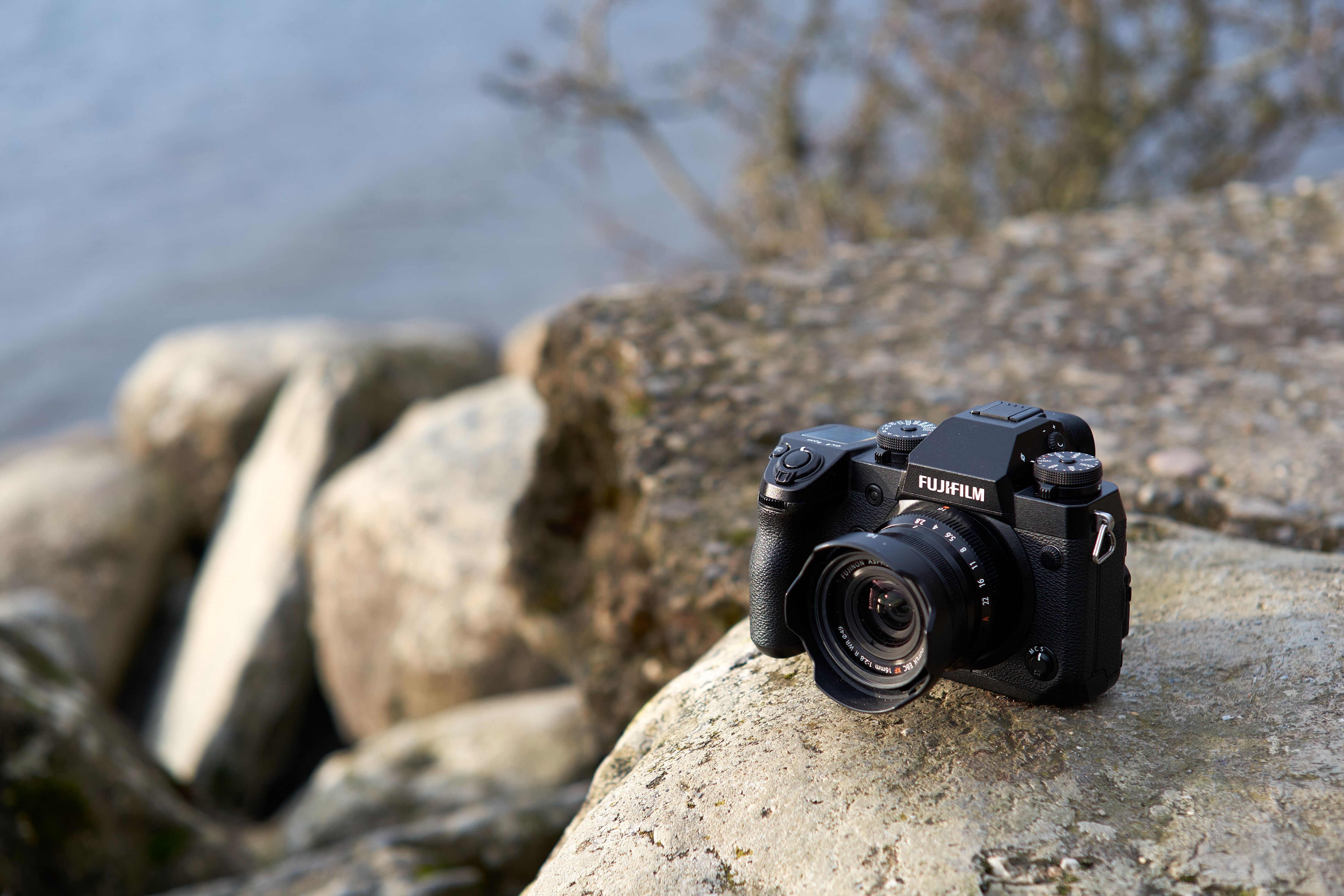 Close up of Camera on Rock · Free Stock Photo