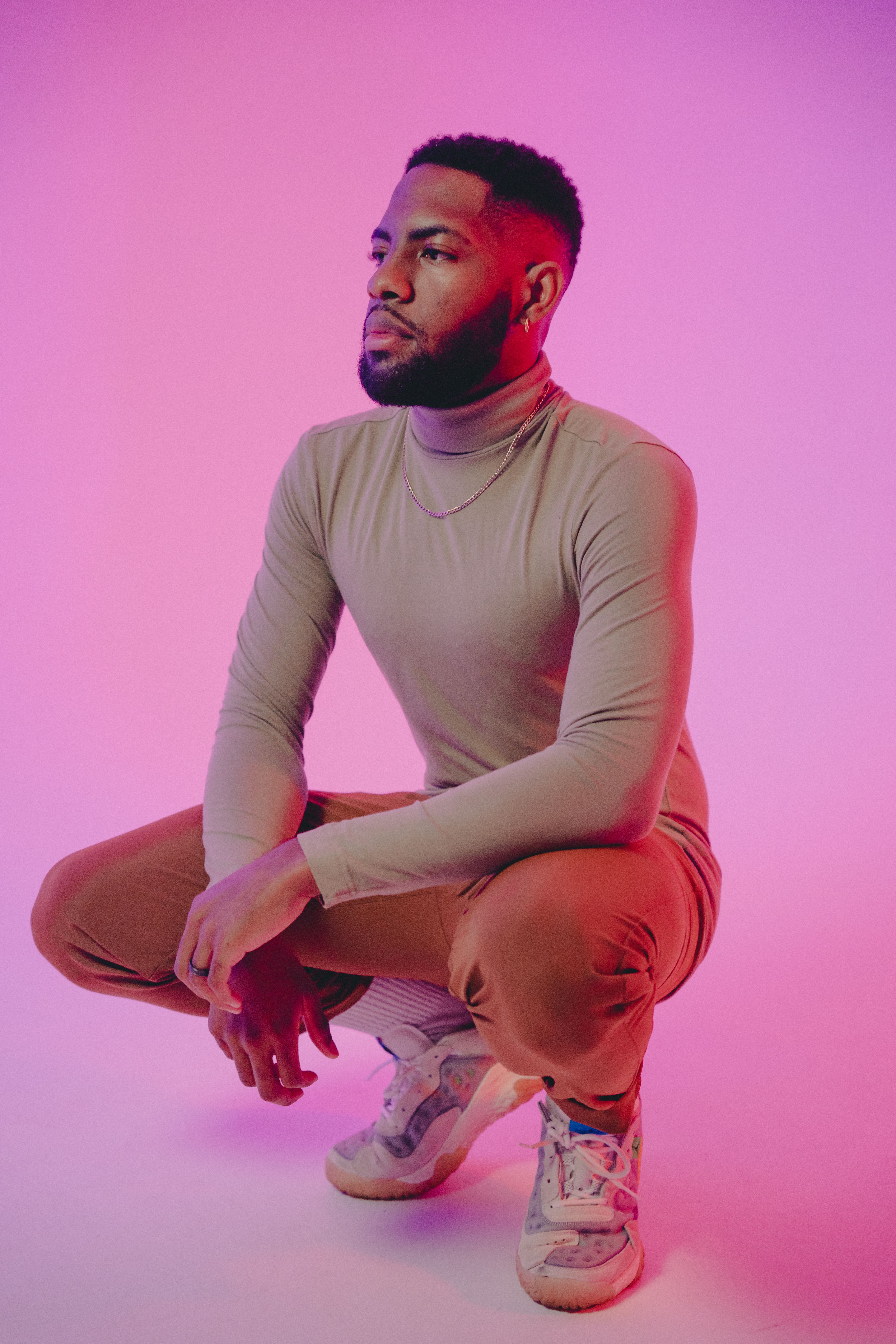 Man Wearing a Turtleneck Long Sleeve Shirt · Free Stock Photo