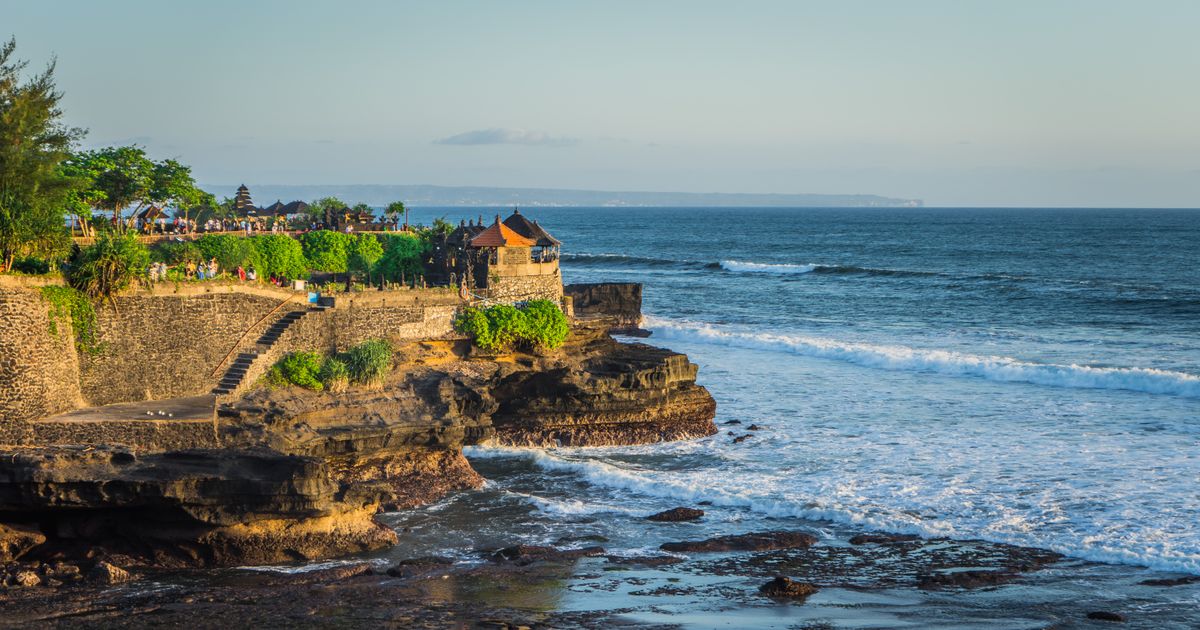 Tanah Lot sea temple on the Tabanan west coastline in Bali, the corridor whose land prices hinge on the 2027 toll road tender