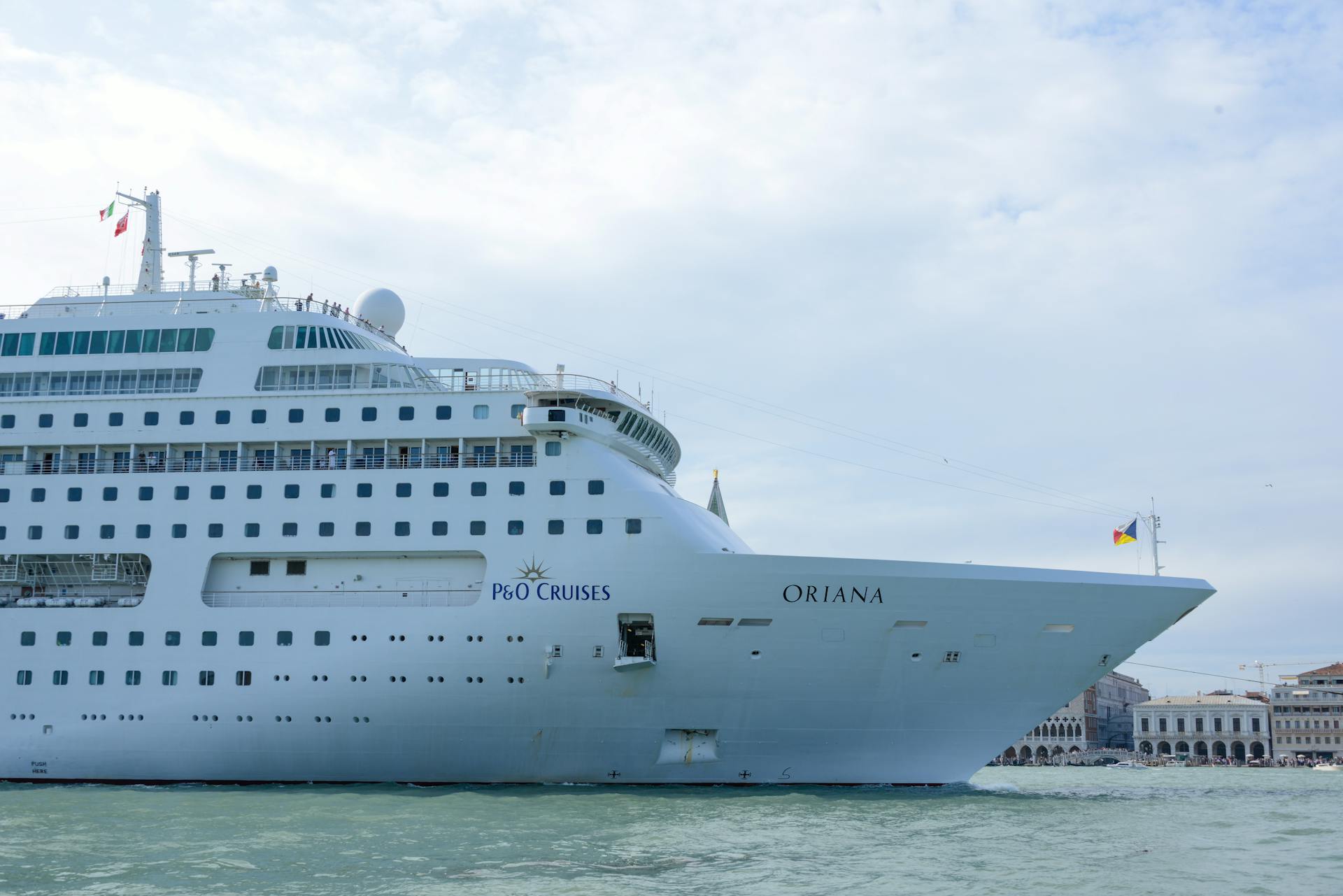 Luxurious cruise ship Oriana sailing through the waters, showcasing elegance and travel.