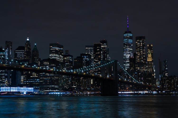 Brooklyn Bridge And New York At Night