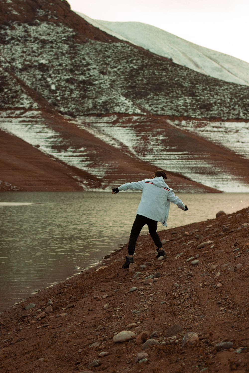 Business Throwing Rocks Person in Jacket Throwing Rock · Free Stock Photo