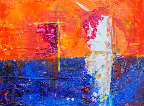 这幅抽象画色彩丰富，纹理细腻，橙蓝两色充满活力