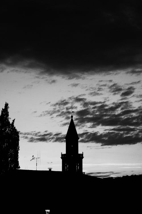 Cloud over Tower Silhouette in Black and White