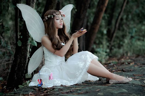 Free Beautiful Fairy in White Dress Stock Photo