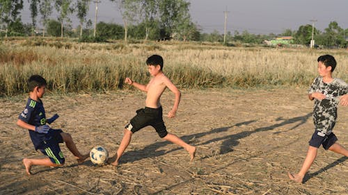 Boys Playing Football