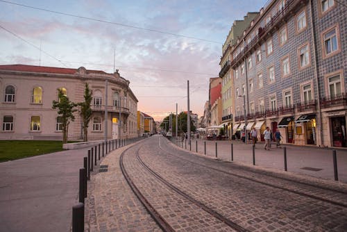 People Walking on Sidewalk