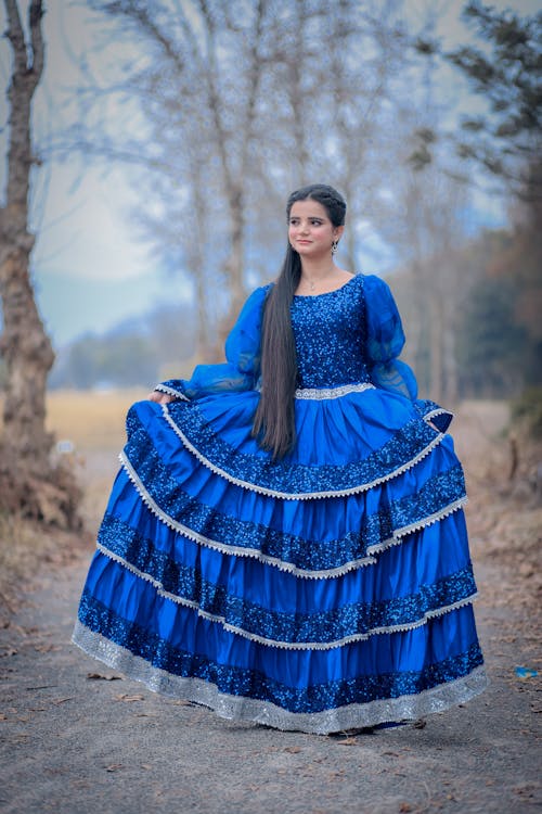 Woman in Blue, Traditional Dress
