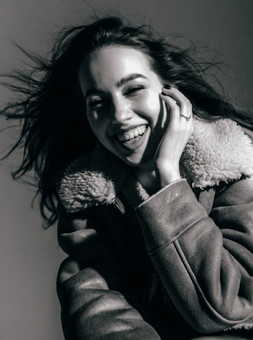 Young Woman in a Warm Jacket Smiling 