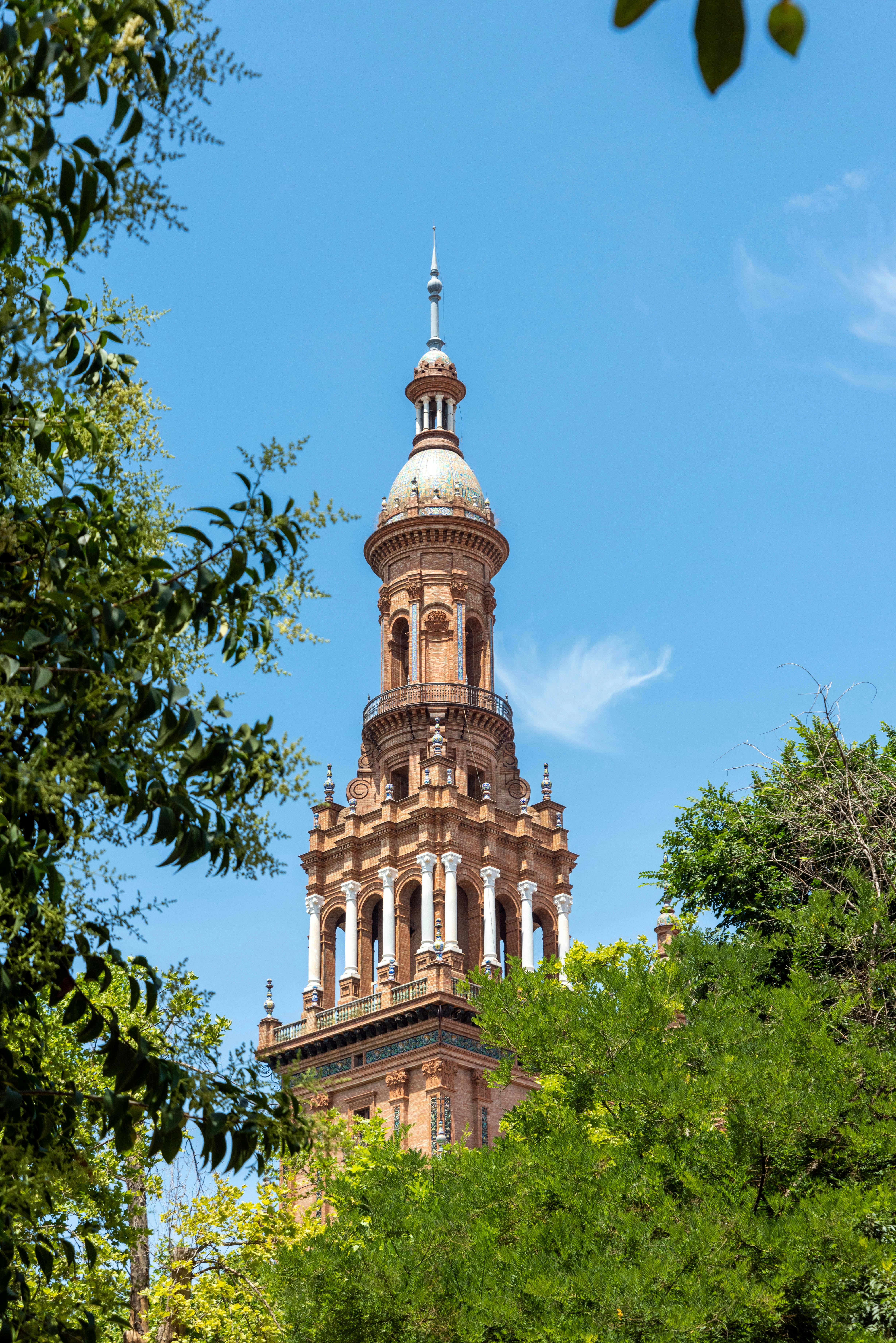 old historic cathedral tower against blue sky