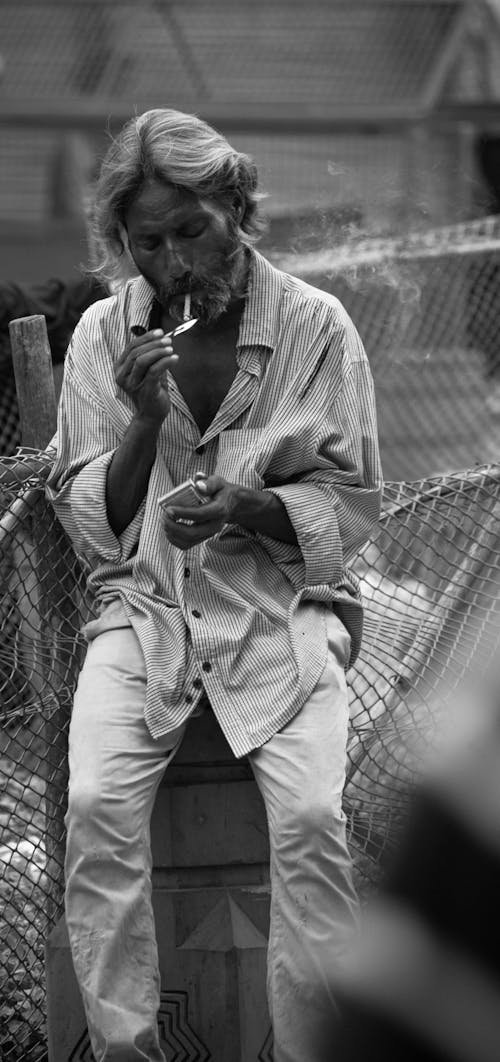 Black and White Portrait of a Man Smoking