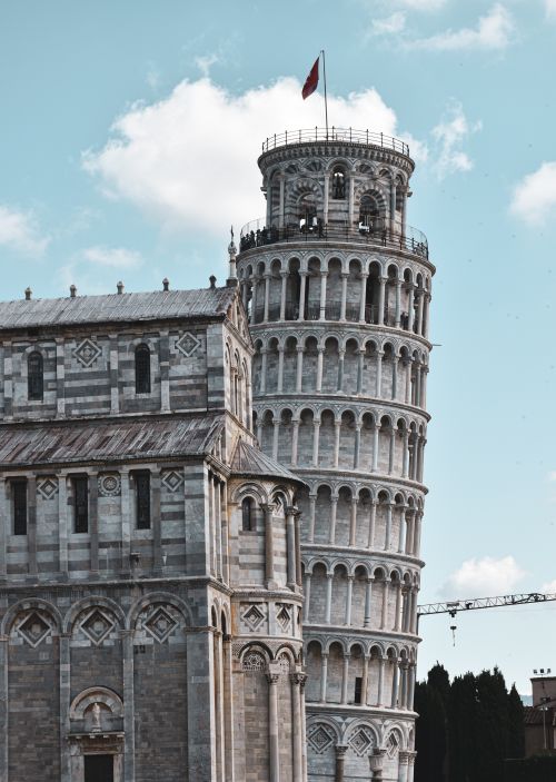 Free Leaning Tower of Pisa with the adjacent Pisa Cathedral, a UNESCO site. Stock Photo