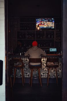 A user navigating the Pluto TV interface to watch live TV for free on a smart device.